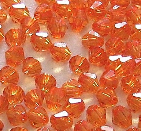 100 Stk. Acryl-Schliffperlen Rhombe Orange 4mm