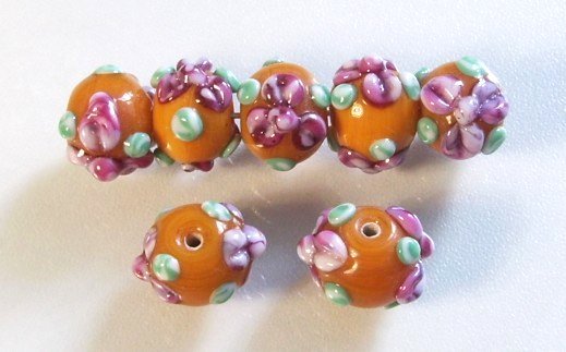 1 Stk. Lampwork Glasperle * Orange mit Blüten * 17,5x14,5-16,5mm