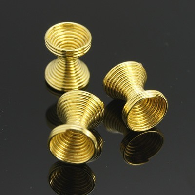 10 Stk. Stahlperlen Spiralperlen Diabolo Spacer Gold 12x7mm